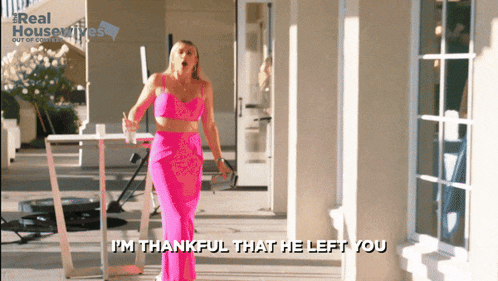 a woman in a pink dress says i 'm thankful he left you