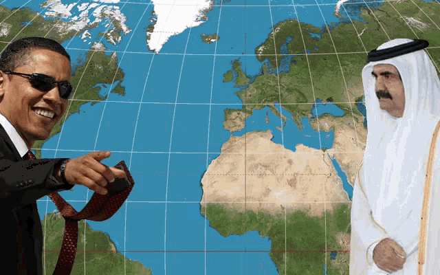 two men are standing in front of a map of the world and one is wearing sunglasses