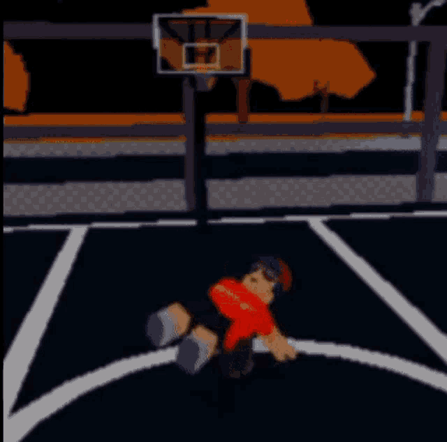 a cartoon character is laying on the ground on a basketball court .