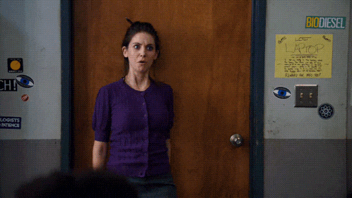 a woman standing in front of a door with a sign that says biodiesel