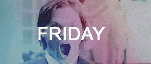 a man is smiling in front of a friday sign