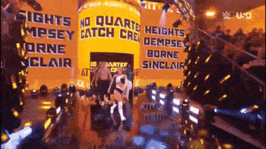 a wrestling ring with a sign that says fights no quarte catch crew