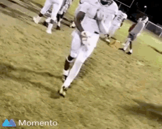 a football player with the number 12 on his jersey