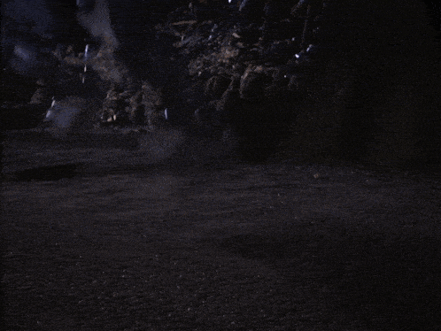 a close up of a person with sparks coming out of their legs