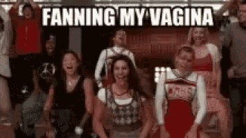 a group of cheerleaders are dancing in front of a sign that says ' fanning my vagina ' .