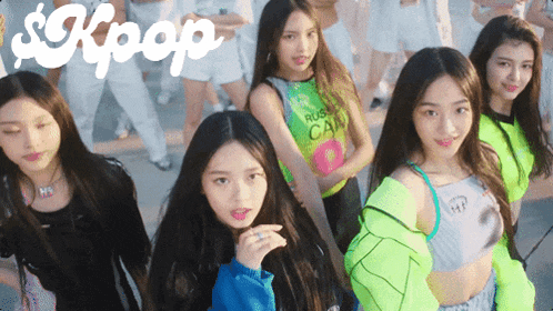 a group of young girls are standing next to each other with the word kpop on the bottom