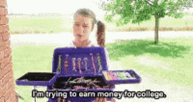 a girl is standing in front of a toolbox and saying i 'm trying to earn money for college