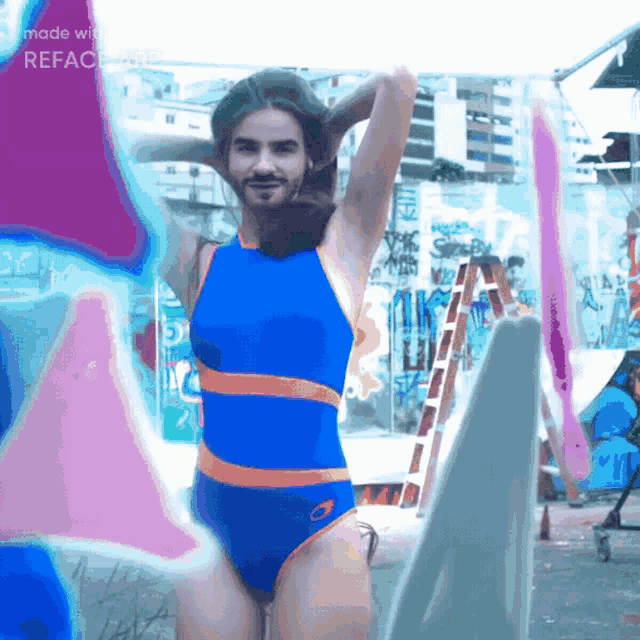 a man in a blue and orange swimsuit is made with refac