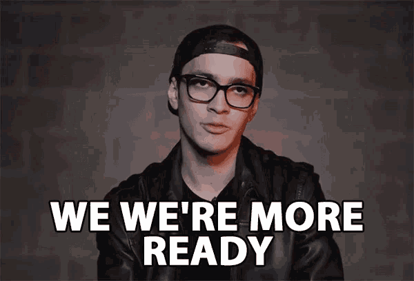 a man wearing glasses and a black hat says we we 're more ready
