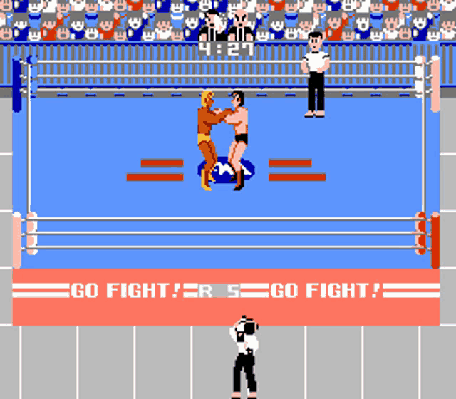 a video game shows two wrestlers in a ring with a sign that says go fight on it
