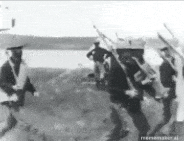a black and white photo of a group of soldiers marching in a line with guns .