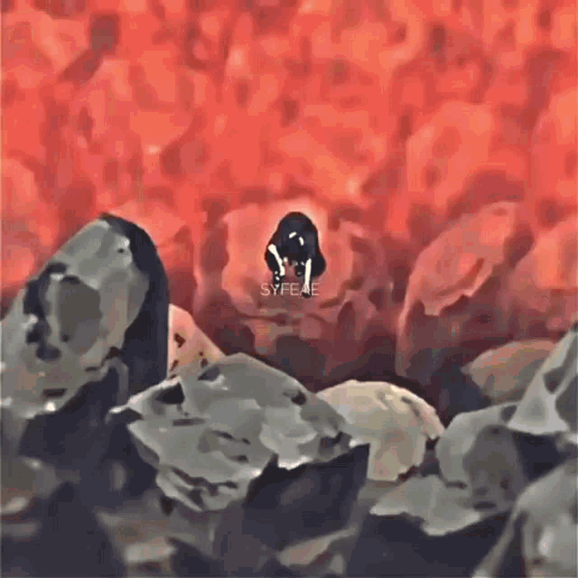 a painting of a person standing on top of a pile of rocks in front of a red background .