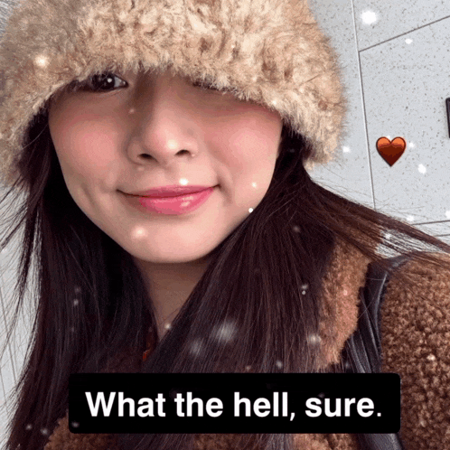 a woman wearing a fur hat with the words what the hell sure on the bottom