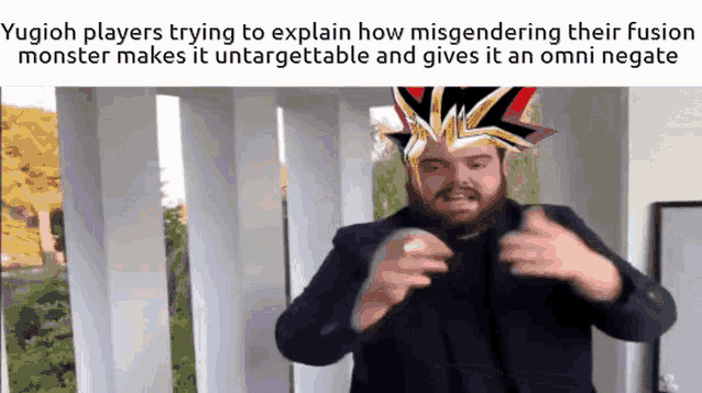 a man with a beard and a yugioh hat on his head
