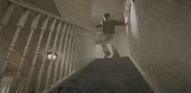 a person is walking up a set of stairs with the words the master on the bottom right