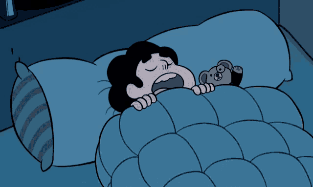 a cartoon character is sleeping in a bed with a teddy bear nearby