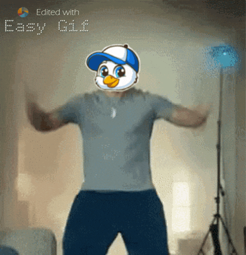 a man is dancing with a cartoon duck on his face and the words easy gif edited with
