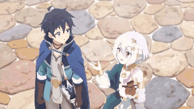 a boy and a girl are standing on a brick sidewalk