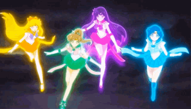 a group of sailor moon characters are dancing in a dark room