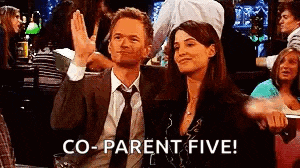 a man and a woman are sitting next to each other at a table in a restaurant .