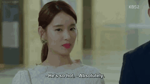 a woman is talking to a man and says he 's so hot - absolutely
