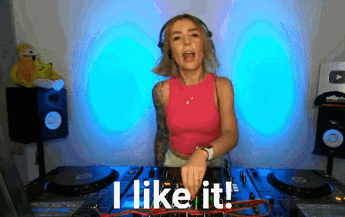 a woman wearing headphones is playing music and the words i like it are visible
