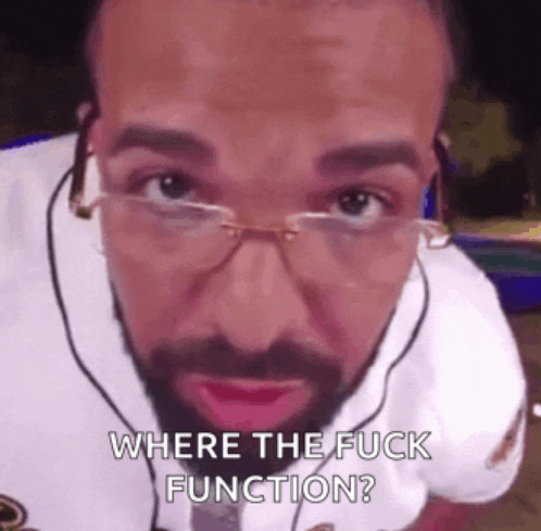 a close up of a man wearing glasses and headphones .