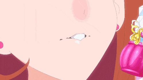 a close up of a girl 's face with a blue and pink dress