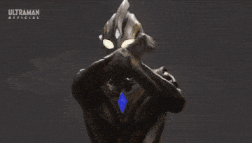 the word ultraman is on the bottom of a picture