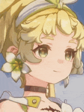 a close up of a girl 's face with flowers in her hair
