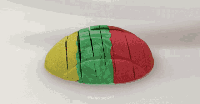 a piece of sand that looks like a bread loaf has been cut into slices
