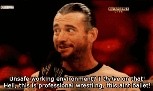 a man is talking into a microphone and says " unsafe working environment i thrive on that "