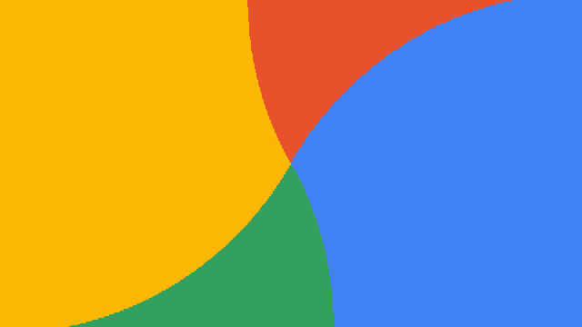 a yellow red green and blue circle with a blue circle in the middle