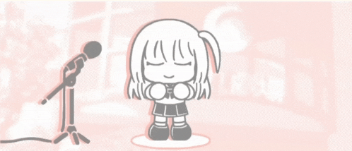 a girl is standing in front of a microphone