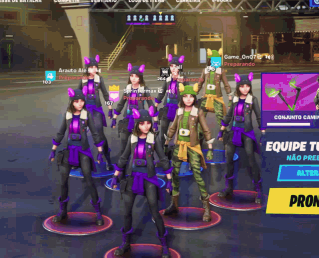 a group of girls standing in front of a screen that says equipe to