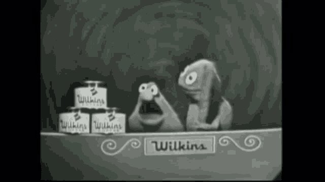 a black and white drawing of sesame street characters standing in front of wilkins cans