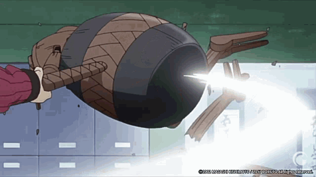 a person is holding a large object with a light coming out of it in a room