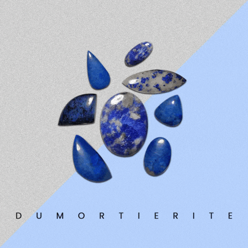 a collection of blue stones with the word dumortierite written on the bottom