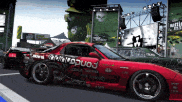 a red sports car with the number 3 on the side is parked in front of a sprite billboard
