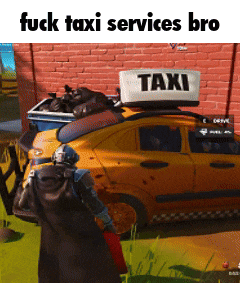 a man standing in front of a yellow taxi with a sign on top that says taxi