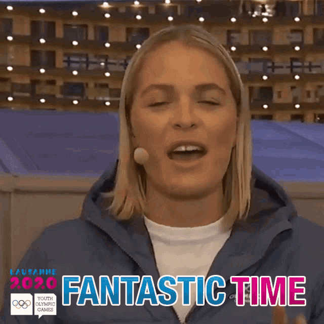 a woman in a blue jacket with the words fantastic time on the bottom right