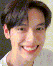 a close up of a person 's face with a smile on it .