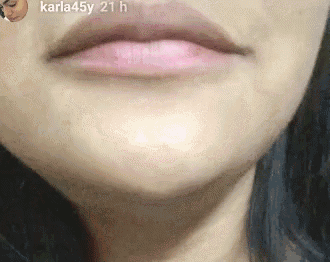 a close up of a woman 's lips with a caption that says karla45y 21 h .