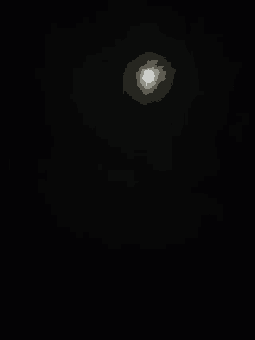 a full moon is visible through the clouds in a dark night sky