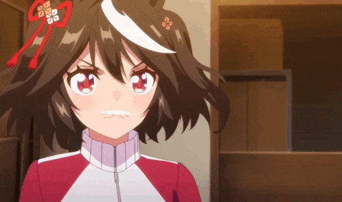a close up of a girl with a ponytail and a red and white jacket
