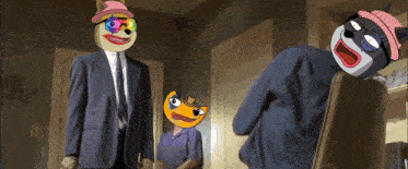 a man in a suit and tie stands next to a woman and two cartoon animals