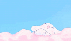 a cartoon bunny is laying on a pink cloud in the sky .