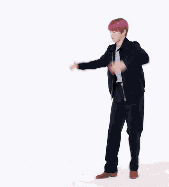 a man with pink hair is wearing a black suit