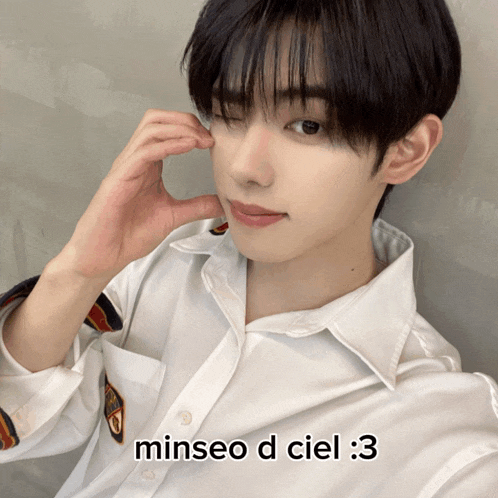 a close up of a person 's face with the words minseo d ciel 3 below it