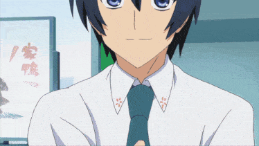 a close up of a person wearing a blue tie